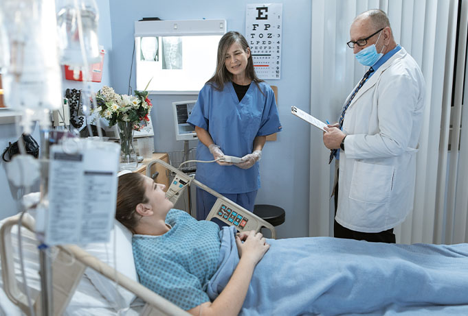 healthcare professionals with patient