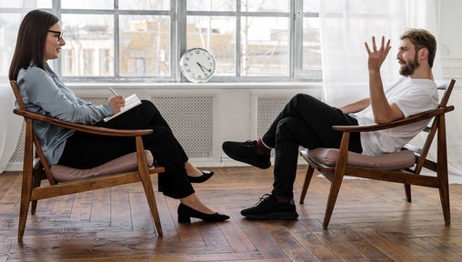 Social Worker Speaking with a person