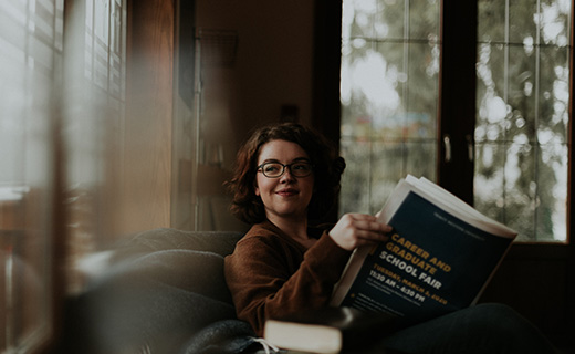 Student reading career guide