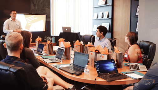 Advertising Salesman in a boardroom